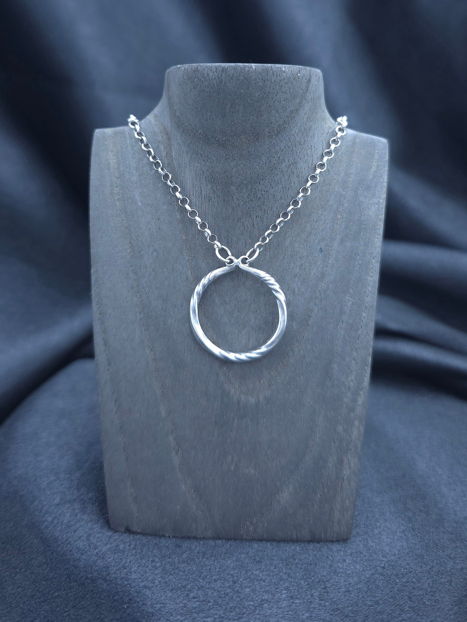 Simply twisted sterling silver pendant