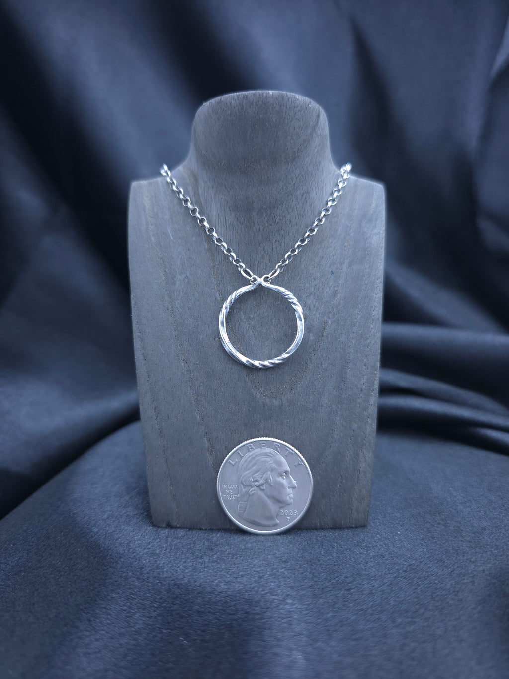 Simply twisted sterling silver pendant