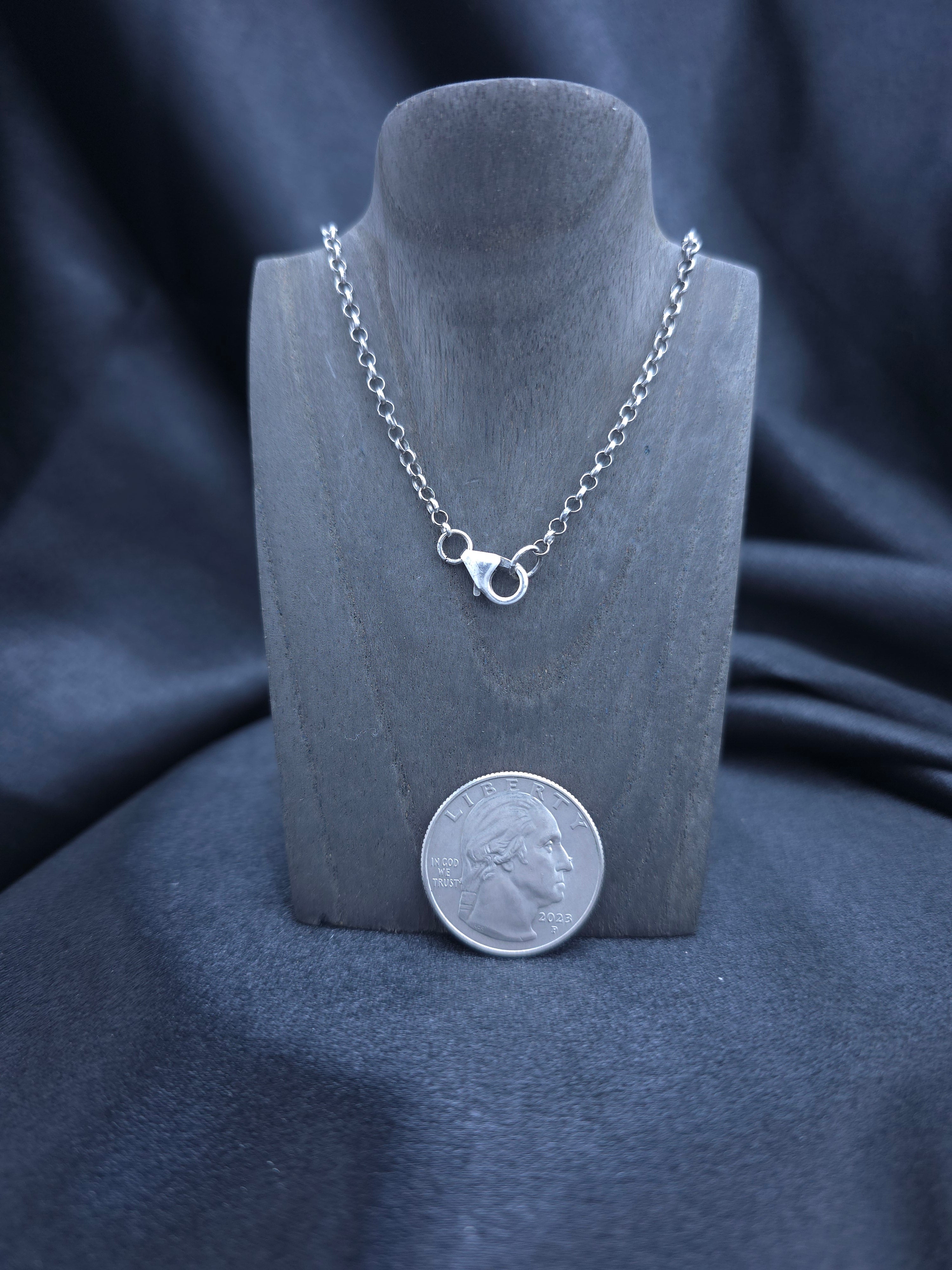 Simply twisted sterling silver pendant